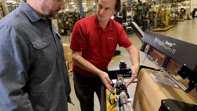 A Pregis technician is demonstrating the Pregis Sharp MaxPro 18